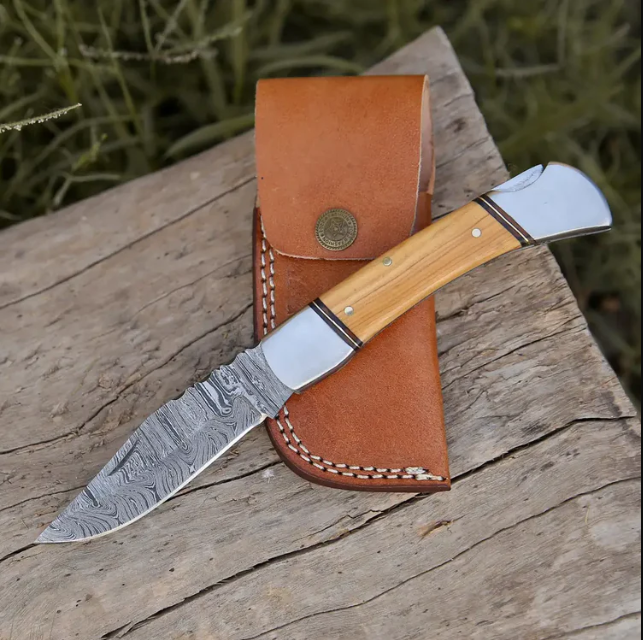 9-inch handmade Damascus steel pocket knife with a back lock mechanism