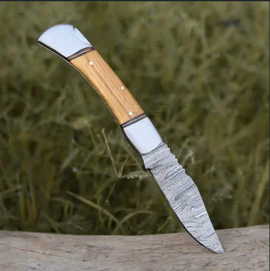 Damascus steel folding knife with back lock and stylish olive wood handle