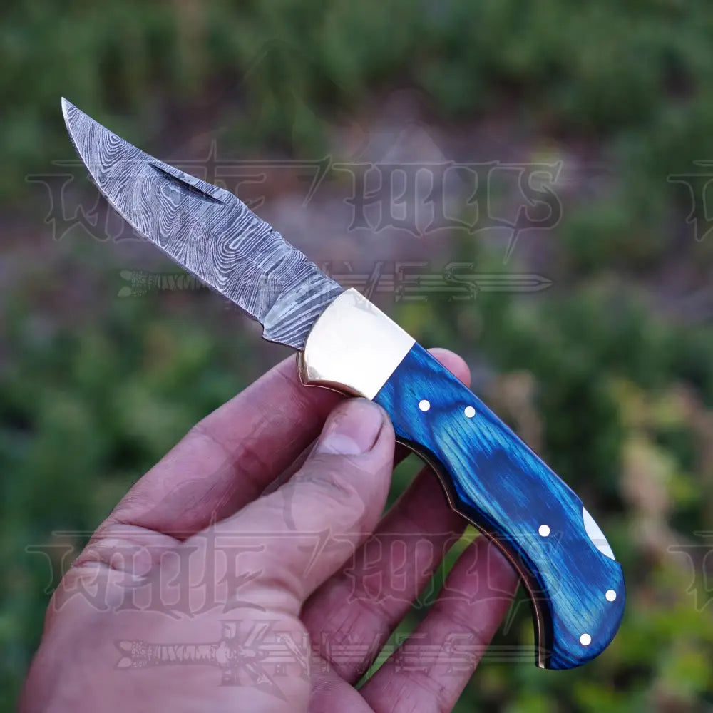 Handmade Damascus Steel Hunting Folding Knife with Pocket Clip - Camping Folding Blade With Blue Wood Handle WH 1256-CP