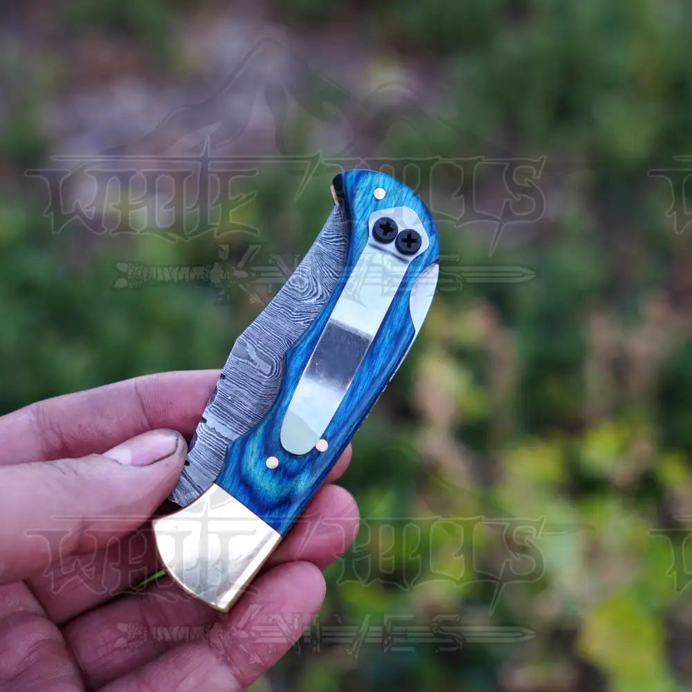 Handmade Damascus Steel Hunting Folding Knife with Pocket Clip - Camping Folding Blade With Blue Wood Handle WH 1256-CP