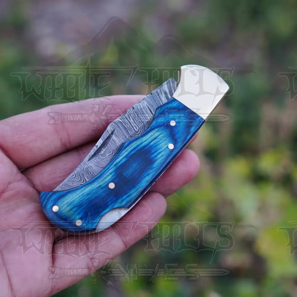 Handmade Damascus Steel Hunting Folding Knife with Pocket Clip - Camping Folding Blade With Blue Wood Handle WH 1256-CP