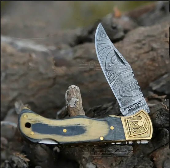 HANDMADE DAMASCUS STEEL FOLDING KNIFE WITH SHEATH	- STAIN WOOD HANDLE WITH ENGRAVED BRASS EAGLE BOLSTER WH 5048