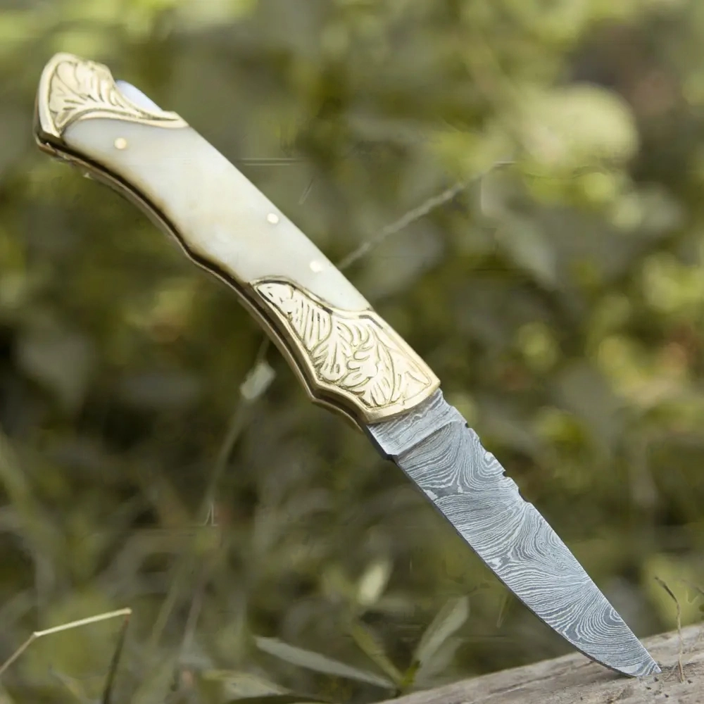 white bone handle knife